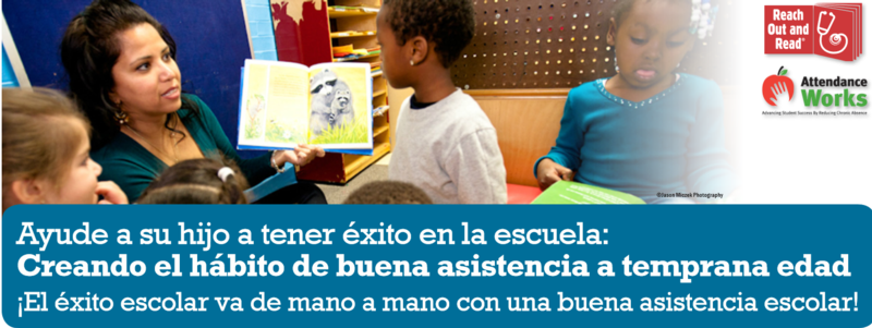 Teacher reading a book with students